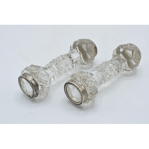 66 - Silver and glass knife rests, a pair (2).