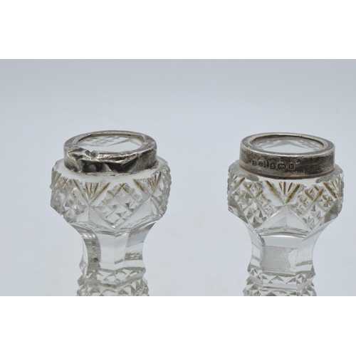 66 - Silver and glass knife rests, a pair (2).