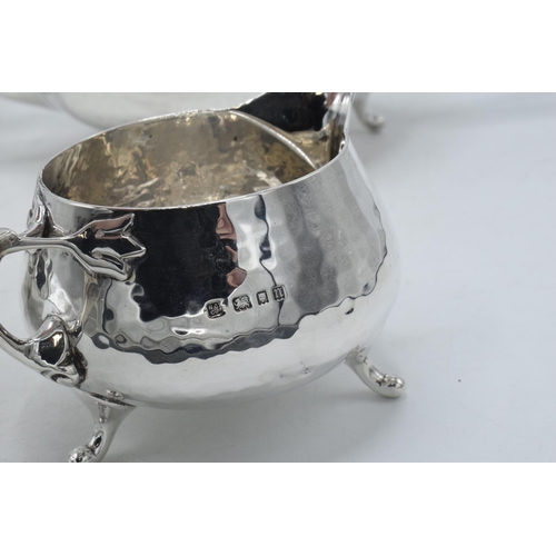 76 - Hallmarked silver four piece tea set with ebonised handles and finials to consist of a teapot, coffe... 