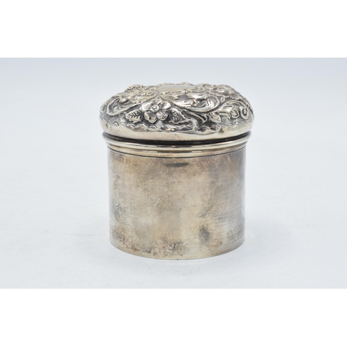 81 - Hallmarked silver lidded pot with repousse decoration, 90.0 grams, Birmingham 1900.