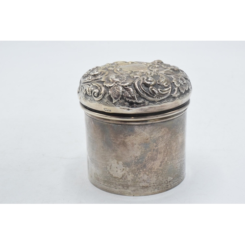 81 - Hallmarked silver lidded pot with repousse decoration, 90.0 grams, Birmingham 1900.