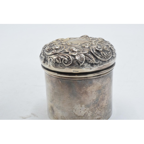 81 - Hallmarked silver lidded pot with repousse decoration, 90.0 grams, Birmingham 1900.