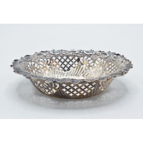 84 - Hallmarked silver ornate pierced bonbon dish, 58.2 grams / 1.87 oz, 11.5cm diameter, Sheffield 1894.