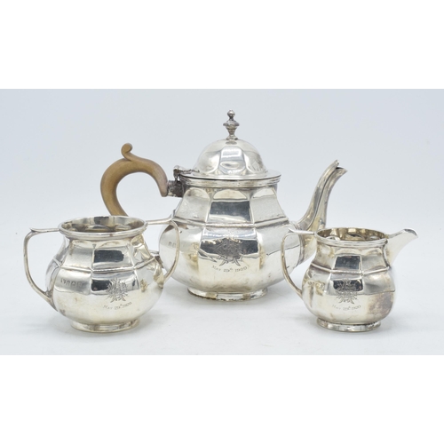 Hallmarked silver 3-piece teaset to include teapot, cream and sugar with masonic crest and wooden handle (3), gross weight 649.8 grams / 20.9 oz, Birmingham 1919.