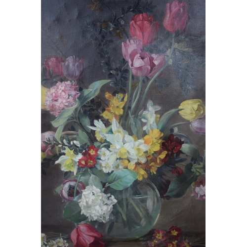 404 - Albert Williams (British 1922-2010) oil on canvas, still life of flowers in globular glass vase upon... 