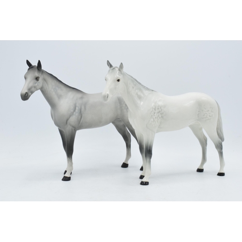 60 - A pair of Beswick Bois Roussel horses to include gloss grey and matte grey (2).