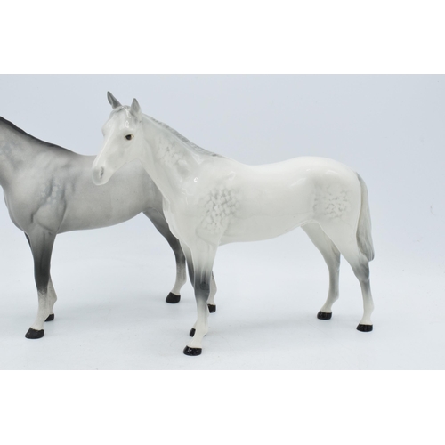 60 - A pair of Beswick Bois Roussel horses to include gloss grey and matte grey (2).