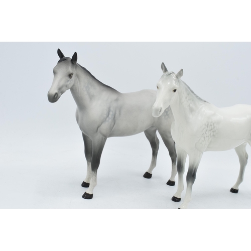 60 - A pair of Beswick Bois Roussel horses to include gloss grey and matte grey (2).