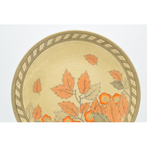 74 - Crown Ducal Charlotte Rhead charger decorated in the Golden Leaves pattern, 32cm diameter.