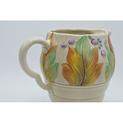 84A - Clarice Cliff Newport Pottery large floral ribbed jug '41A', 19cm tall.