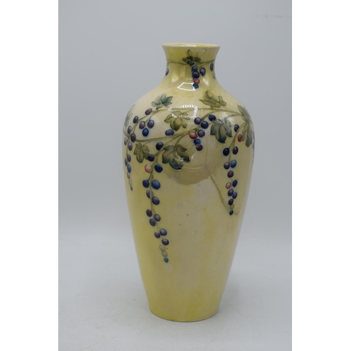 85 - Moorcroft lustre vase with grape and vine pattern, professionally restored, 27cm tall.