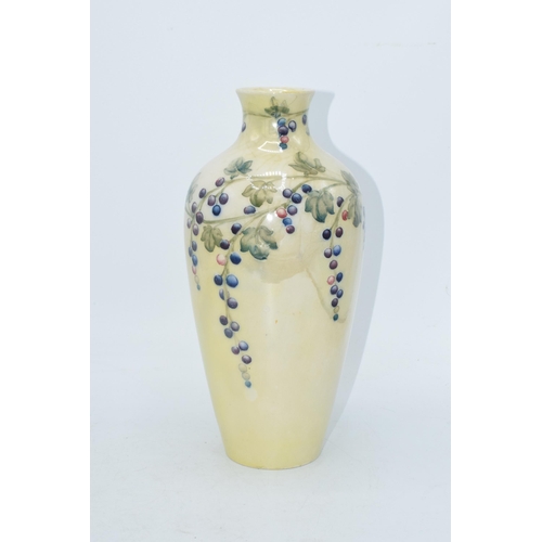 85 - Moorcroft lustre vase with grape and vine pattern, professionally restored, 27cm tall.