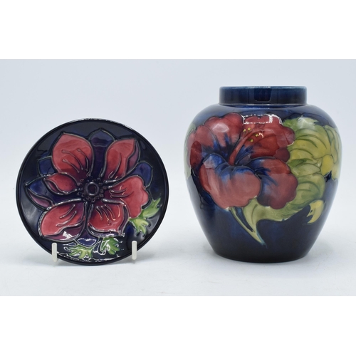 94 - Moorcroft Anemone pin dish on blue background together with Hibiscus on blue ginger jar (missing lid... 