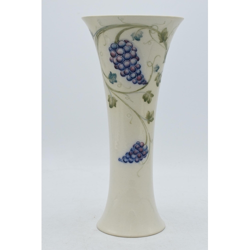 90C - William Moorcroft 'Grape' lustre trumpet vase, 24.5cm tall (professionally restored).