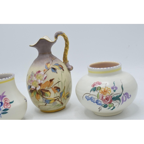 46 - 19th century continental pottery ewer decorated with a floral spray, impressed numbers to base, 16.5... 