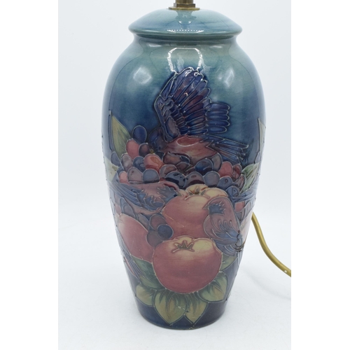 102 - Large Moorcroft lamp base in Finch and Berry pattern, 26.5cm tall exc. brass fittings (cracked).