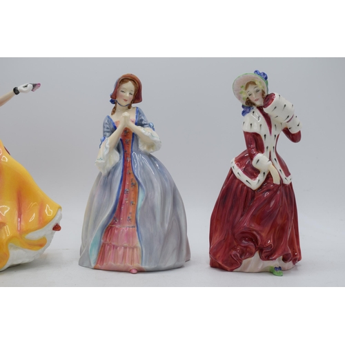 112 - A trio of Royal Doulton lady figures to include Belle HN3703, Deirdre HN2020 and Christmas Morn HN19... 