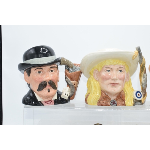 120E - Royal Doulton character jugs from the Wild West series to include Annie Oakley, Wyatt Earp, Doc Holl... 