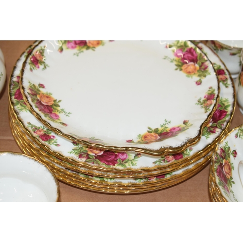 137 - Royal Albert Old Country Roses teaware to include a teapot, urn, sugar, dinner plates, bowls, cake p... 