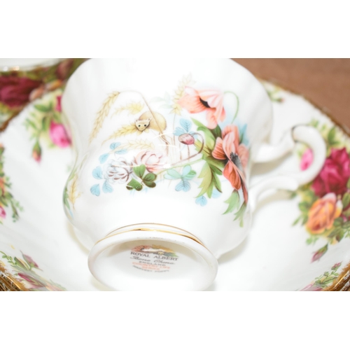 137 - Royal Albert Old Country Roses teaware to include a teapot, urn, sugar, dinner plates, bowls, cake p... 