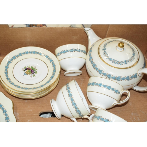 140G - Wedgwood tea ware in the 'Appledore' pattern to include a teapot, 6 cups, 6 saucers, 6 sides, a cake... 