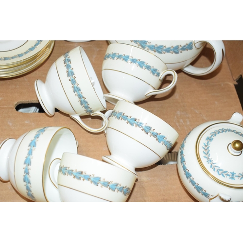 140G - Wedgwood tea ware in the 'Appledore' pattern to include a teapot, 6 cups, 6 saucers, 6 sides, a cake... 