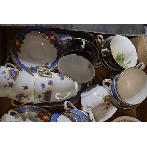 144 - A collection of tea ware in floral patterns to include a Royal Crown Derby Derby Posies jug, Gladsto... 