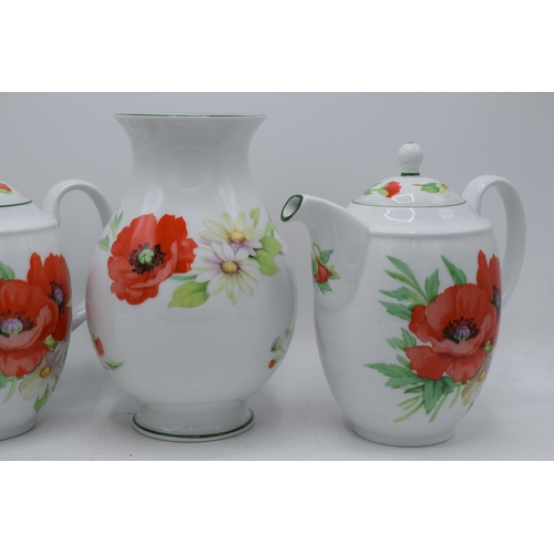 150 - Royal Worcester Poppies tea ware to include 2 teapots, a vase and 2 storage jars (5).