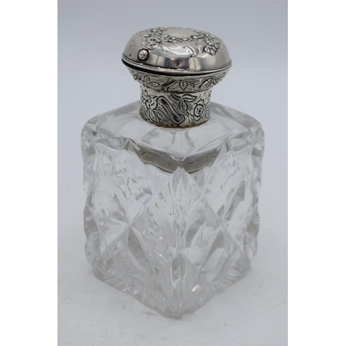 173 - Hallmarked silver topped inkwell, William Comyns & Sons, hallmarks rubbed, 14cm tall.