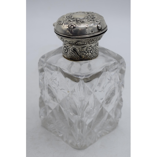 173 - Hallmarked silver topped inkwell, William Comyns & Sons, hallmarks rubbed, 14cm tall.