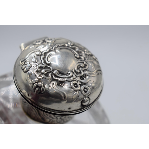 173 - Hallmarked silver topped inkwell, William Comyns & Sons, hallmarks rubbed, 14cm tall.