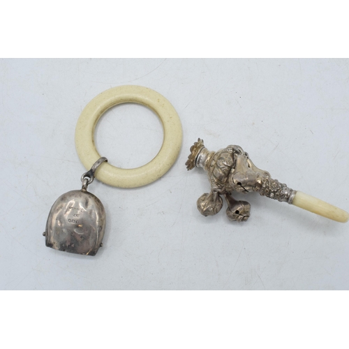 174 - Hallmarked silver baby bell with teething ring together with a silver (marked 925) baby rattle with ... 