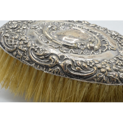 184A - A hallmarked silver hand mirror, together with silver handled brush and other items to include potte... 