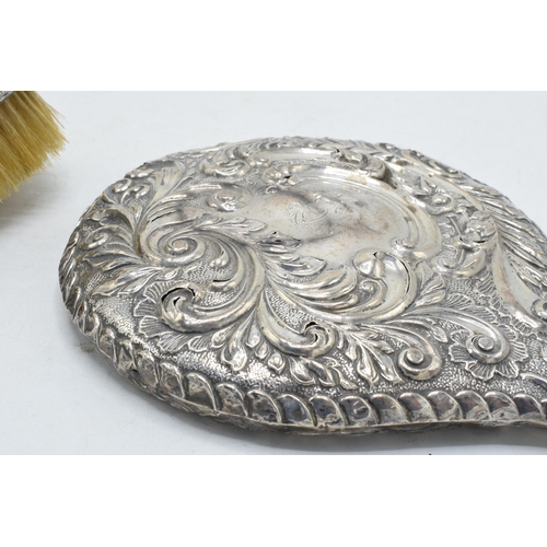 184A - A hallmarked silver hand mirror, together with silver handled brush and other items to include potte... 