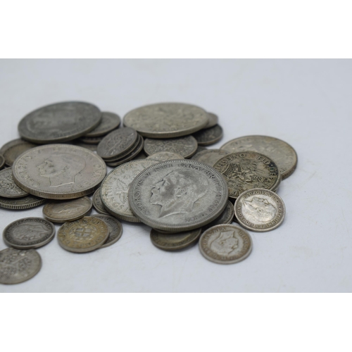 186 - A collection of 1920-1946 silver coinage, approx. 160 grams, to include various denominations.