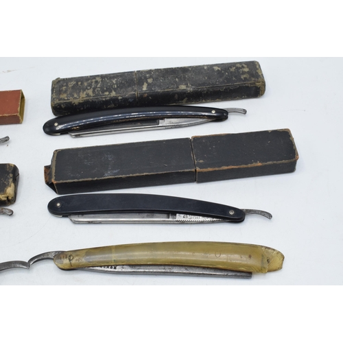 326 - A collection of vintage cut throat razors, some with boxes, to include Solingen, Crown & Sword, Isko... 