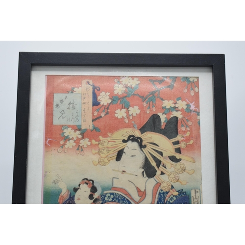 329 - Japanese woodblock and hand tinted print of a Geisha girl, with marks to top left, 31x22cm exc frame... 