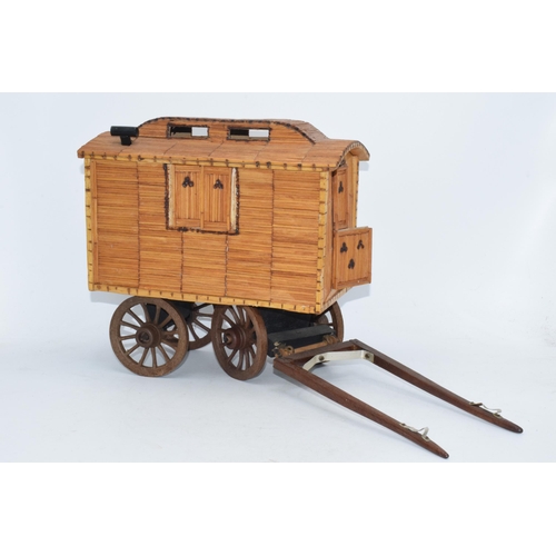 330 - Vintage matchstick model of a gypsy caravan, 26cm long exc stretchers.