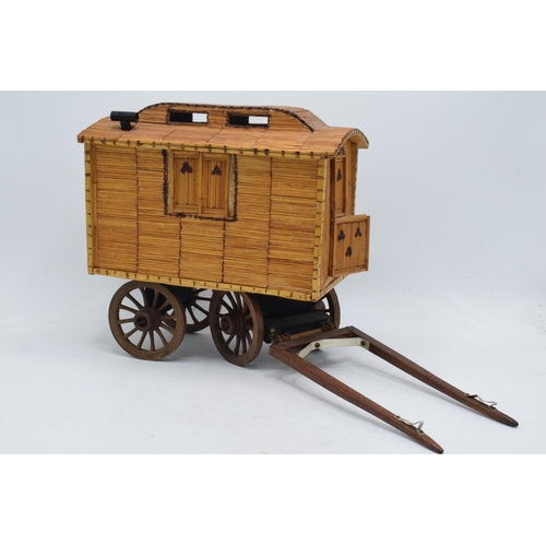 330 - Vintage matchstick model of a gypsy caravan, 26cm long exc stretchers.