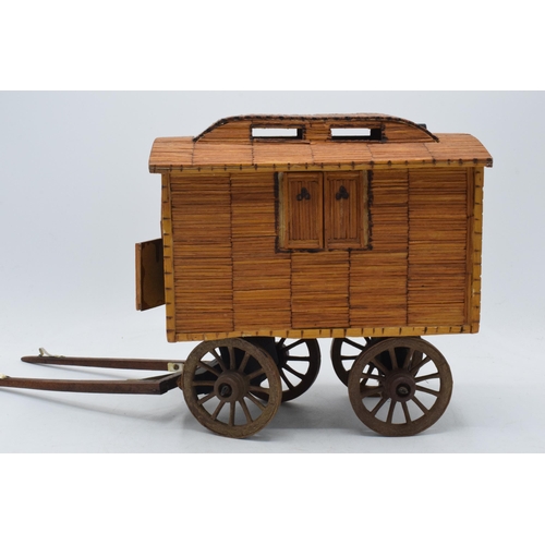 330 - Vintage matchstick model of a gypsy caravan, 26cm long exc stretchers.