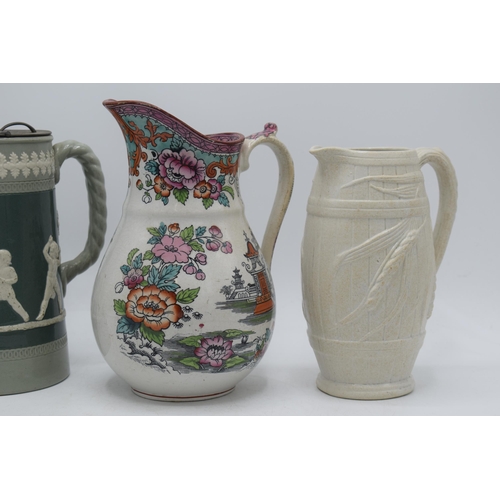 45 - A collection of 19th century pottery to include Staffordshire wheat / corn pitcher, a Dudson water j... 