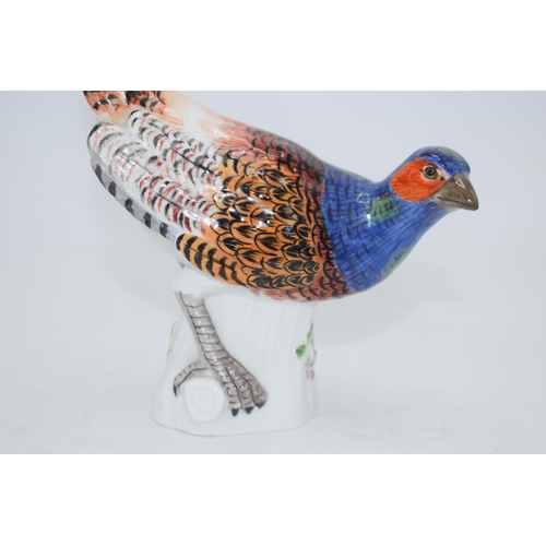 49 - Meissen figure of a Pheasant, 16cm tall, with impressed numerals and 2 crossed swords backstamp.