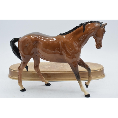 66 - Beswick Spirit of Youth in gloss brown on ceramic base (detached).