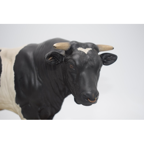 74 - Beswick Friesian Bull A2580 on wooden base.