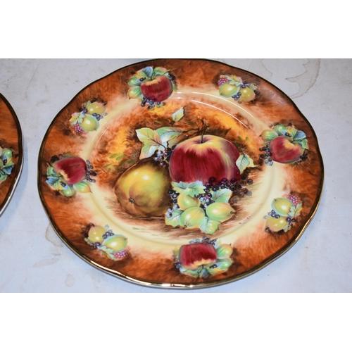 82 - Aynsley bird and fruit plate together with Raymond Everill and Paul Smith Evesham fruit scene plates... 