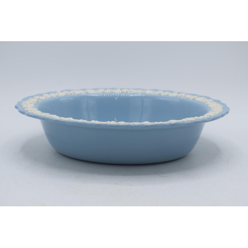 87 - Wedgwood Queensware white on blue vegetable bowl, 24cm diameter.