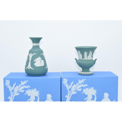 88 - Wedgwood Jasperware in teal: to include a pair of candlesticks, a spoon, a trinket, vases etc (9).