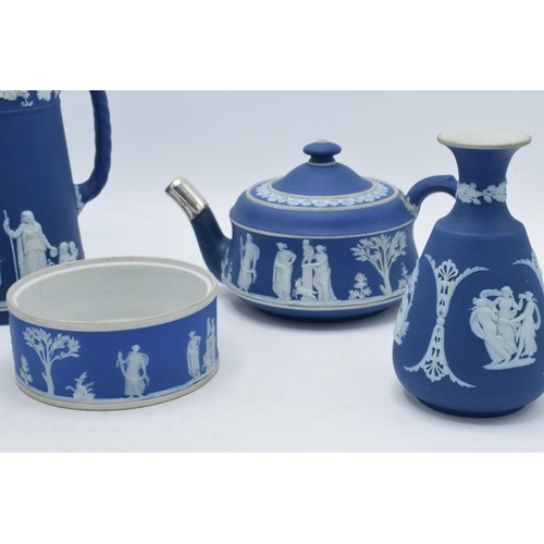 88B - 19th century and later Wedgwood Jasperware in dip / dark blue: to include a teapot, water jugs, a va... 