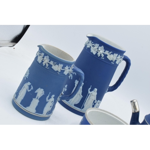 88B - 19th century and later Wedgwood Jasperware in dip / dark blue: to include a teapot, water jugs, a va... 