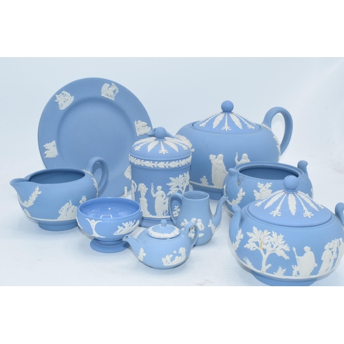 88I - Wedgwood Jasperware in Blue: to include a teapot,milk, lidded sugars, trinket and miniatures .